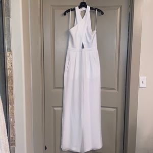 Perfect white jumpsuit with skirt overlay!
